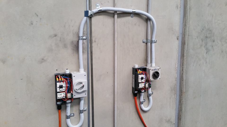Industrial Machine shop hydraulic pump supply wiring installation in progress