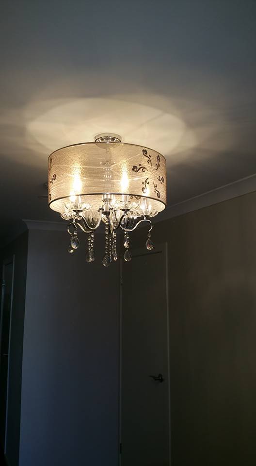 Installation of a chandelier