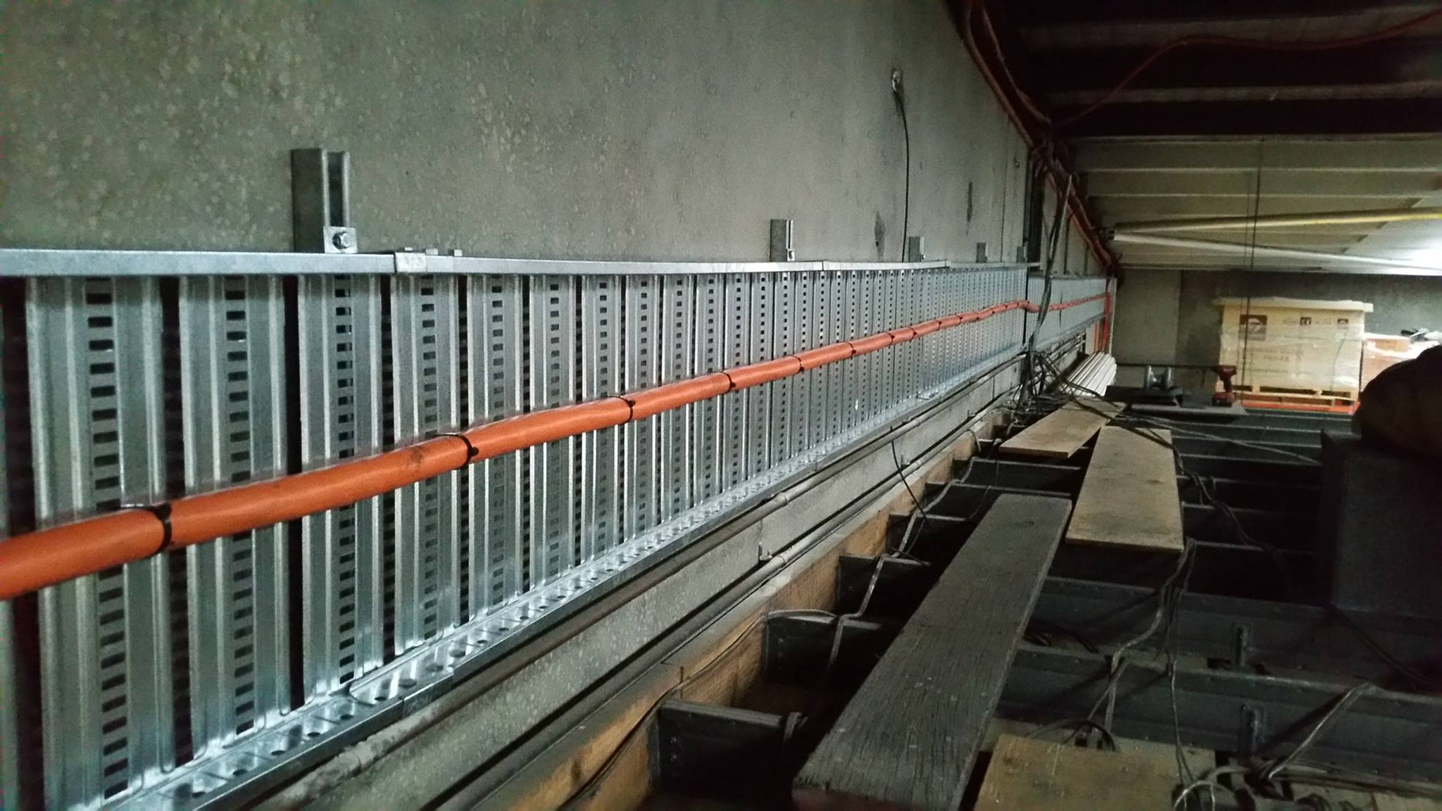 Cable installation showing confined access over roof.