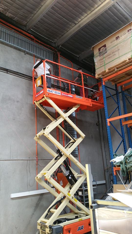 Difficult overhead access, using a scissor lift