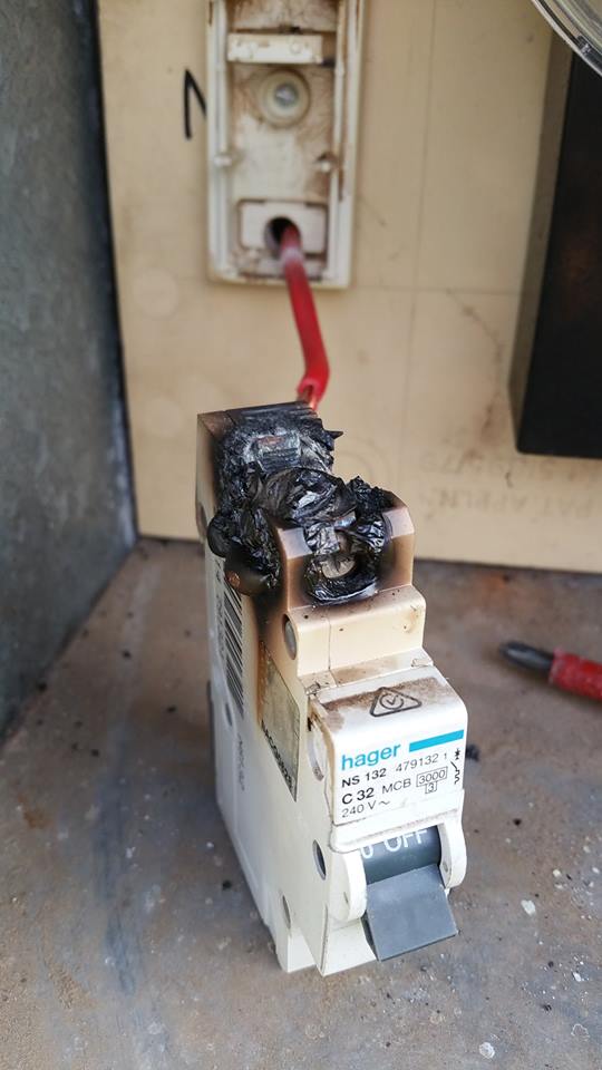Close up view of heat damage to circuit breaker