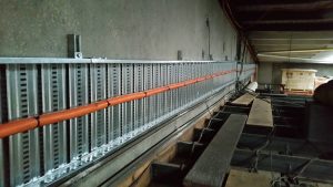 Cable installation showing confined access over roof.