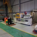 Installation of plastics moulding machinery